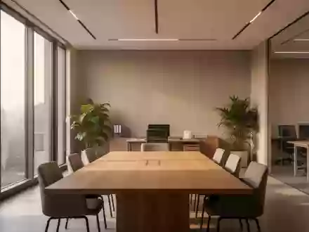Ein minimalistischer, heller Konferenzraum mit Tageslicht und Pflanzen, der eine ruhige und professionelle Arbeitsumgebung darstellt. - Foto: über boerse-global.de