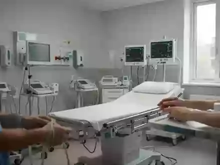 Ein heller, moderner Behandlungsraum in einer Klinik mit medizinischer Ausstattung in einer ruhigen, sterilen Umgebung. - Foto: über boerse-global.de