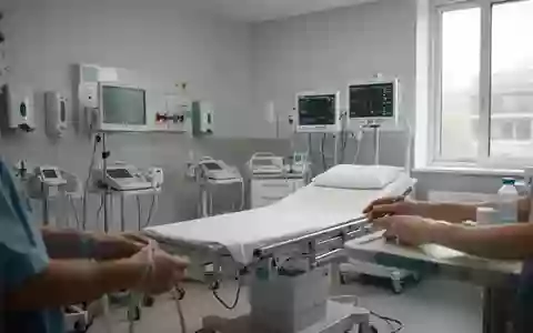 Ein heller, moderner Behandlungsraum in einer Klinik mit medizinischer Ausstattung in einer ruhigen, sterilen Umgebung. - Foto: über boerse-global.de