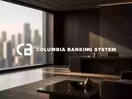 Modernes, minimalistisches Bankbüro mit warmem Licht, das finanzielle Stabilität und Wachstum symbolisiert. - Foto: über boerse-global.de
