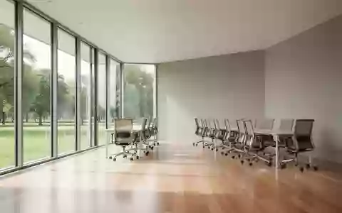Ein helles, modernes Büro mit bodentiefen Fenstern und hochwertigen, ergonomischen Möbeln in einem minimalistischen Raum. - Foto: über boerse-global.de