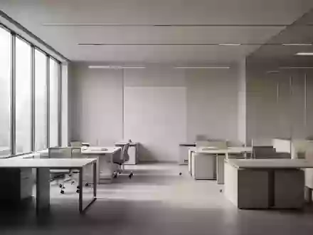 Ein minimalistisches, modernes Bürointerieur in neutralen Tönen mit natürlichem Lichteinfall ohne Personen. - Foto: über boerse-global.de