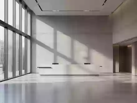 Ein minimalistisch gestalteter Innenraum eines modernen Bankgebäudes mit klaren Linien und natürlichem Lichteinfall. - Foto: über boerse-global.de
