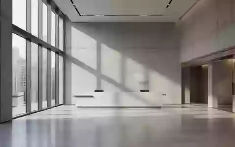 Ein minimalistisch gestalteter Innenraum eines modernen Bankgebäudes mit klaren Linien und natürlichem Lichteinfall. - Foto: über boerse-global.de