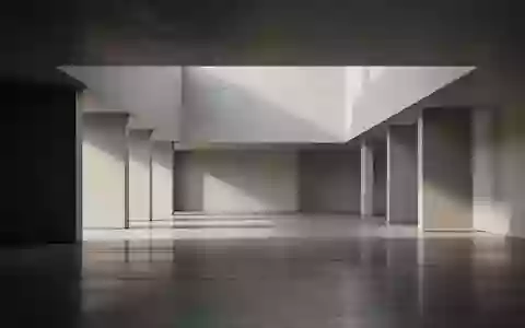 Minimalistische, architektonische Innenansicht mit klaren Linien und natürlichem Licht, die Struktur und Weite symbolisiert. - Foto: über boerse-global.de