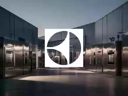 Abstrakte Darstellung einer modernen Produktionsstätte für Haushaltsgeräte in gedimmtem, professionellem Licht. - Foto: über boerse-global.de