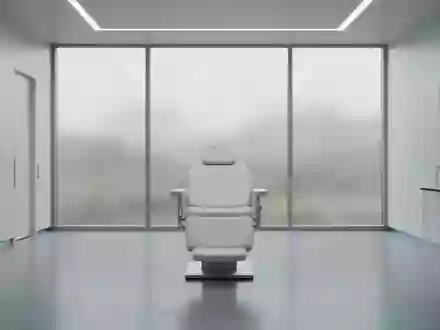 Ein minimalistischer, moderner medizinischer Forschungsraum mit einem leeren Behandlungsstuhl in einer sterilen Umgebung. - Foto: über boerse-global.de