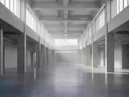 Ein minimalistischer, heller Industrieflur mit poliertem Betonboden und architektonischer Klarheit. - Foto: über boerse-global.de