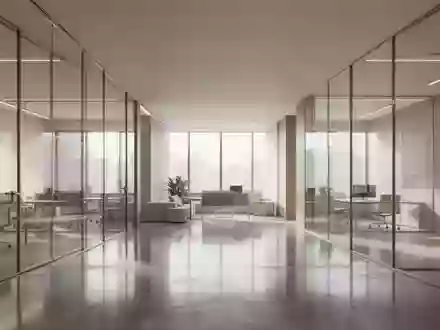 Ein minimalistisch gestalteter, moderner Büroraum mit klaren Linien und hellem Tageslicht. - Foto: über boerse-global.de