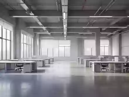 Ein minimalistischer, moderner Schulungsraum mit klaren architektonischen Linien und hellem Tageslicht. - Foto: über boerse-global.de