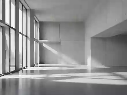 Ein minimalistischer, moderner Innenraum mit klaren architektonischen Linien und neutralen Betonflächen bei natürlichem Licht. - Foto: über boerse-global.de