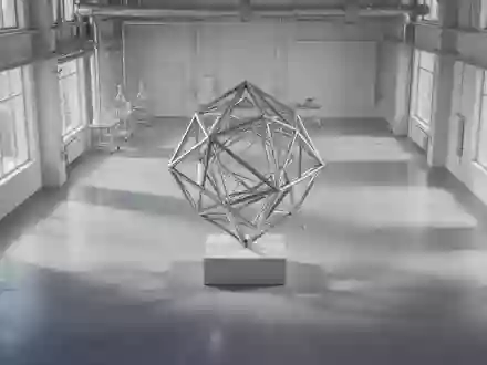 Ein minimalistischer, heller Laborraum mit einer abstrakten geometrischen Metallskulptur als Symbol für technologische Entwicklung. - Foto: über boerse-global.de