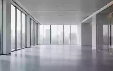 Ein minimalistisches, modernes Bürogebäude mit klaren Linien und natürlichem Licht, das Ordnung und Stabilität vermittelt. - Foto: über boerse-global.de