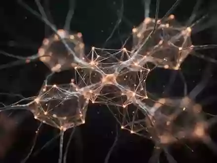 Abstrakte Darstellung neuronaler Netzwerke und synaptischer Verbindungen in einem dunklen, minimalistischen Raum. - Foto: über boerse-global.de