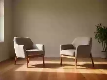 Ein minimalistischer, ruhiger Therapieraum mit einem leeren Sessel und weichem Tageslicht, das sanfte Schatten wirft. - Foto: über boerse-global.de