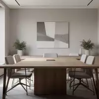 Ein minimalistisch gestalteter Besprechungsraum mit zwei leeren Stühlen an einem Holztisch bei Tageslicht. - Foto: über boerse-global.de