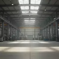 Leere, moderne Industriehalle mit hohen Decken und Stahlträgern in einem Fertigungsbetrieb. - Foto: über boerse-global.de
