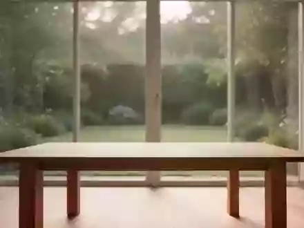 Ein heller, minimalistischer Raum mit natürlichem Lichteinfall und Blick in einen grünen Garten, der Ruhe und Klarheit ausstrahlt. - Foto: über boerse-global.de