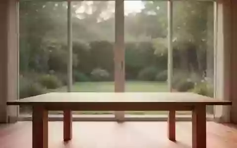 Ein heller, minimalistischer Raum mit natürlichem Lichteinfall und Blick in einen grünen Garten, der Ruhe und Klarheit ausstrahlt. - Foto: über boerse-global.de