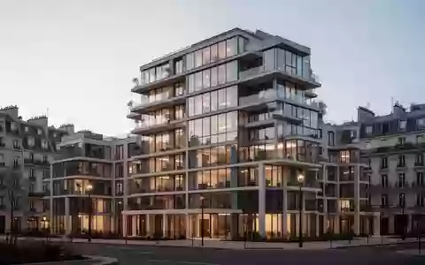 Moderne Wohnanlage in einer europäischen Stadt bei Dämmerung. - Foto: über boerse-global.de