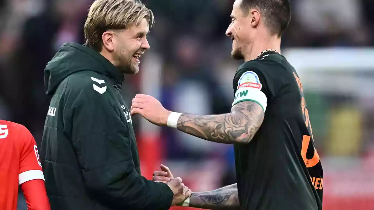 Niclas Füllkrug (l) sieht die Debatte um ein mögliches DFB-Comeback entspannt. - Bild: Florian Wiegand/dpa