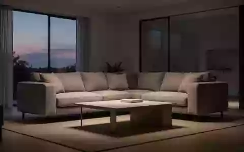 Ein modern eingerichtetes Wohnzimmer mit sanfter, atmosphärischer Beleuchtung und minimalistischem Interieur. - Foto: über boerse-global.de