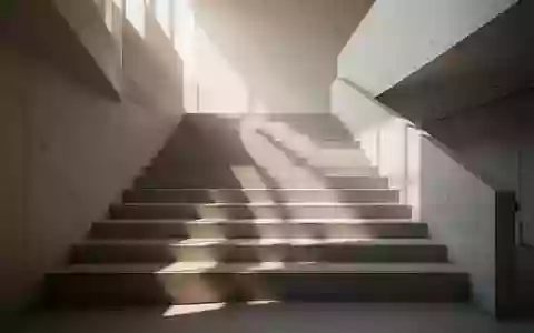Eine minimalistische Treppe in einem hellen, sonnendurchfluteten Raum zur Veranschaulichung alltäglicher Bewegung. - Foto: über boerse-global.de