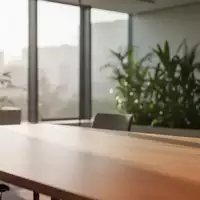 Ein minimalistischer, heller Büroraum mit natürlichem Licht und Pflanzen, der eine ruhige und gesunde Arbeitsumgebung symbolisiert. - Foto: über boerse-global.de