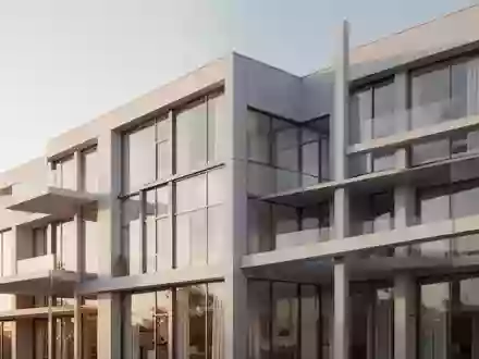 Moderne Fassade eines Wohngebäudes bei Tageslicht. - Foto: über boerse-global.de