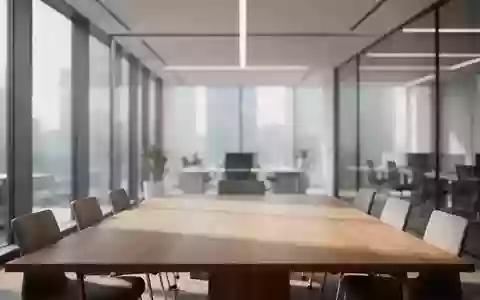 Ein minimalistischer, leerer Konferenzraum in einem modernen Bürogebäude mit hellem Tageslicht. - Foto: über boerse-global.de