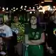 Anhänger des rechten Herausforderers Flávio Bolsonaro reagierten fassungslos. - Bild: Bruna Prado/AP/dpa