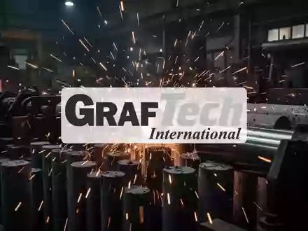 Abstrakte Darstellung industrieller Fertigungsprozesse mit funkelnden Lichtern in einer dunklen Produktionshalle. - Foto: über boerse-global.de