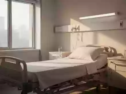 Ein heller, ruhiger Krankenhausraum mit einem unbesetzten Bett und sanftem Tageslicht. - Foto: über boerse-global.de