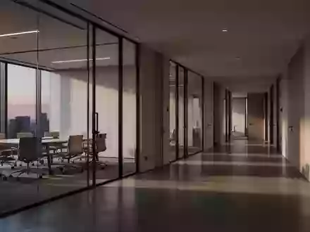 Leere, modern gestaltete Büroflure in einem großen Geschäftskomplex bei Dämmerung. - Foto: über boerse-global.de