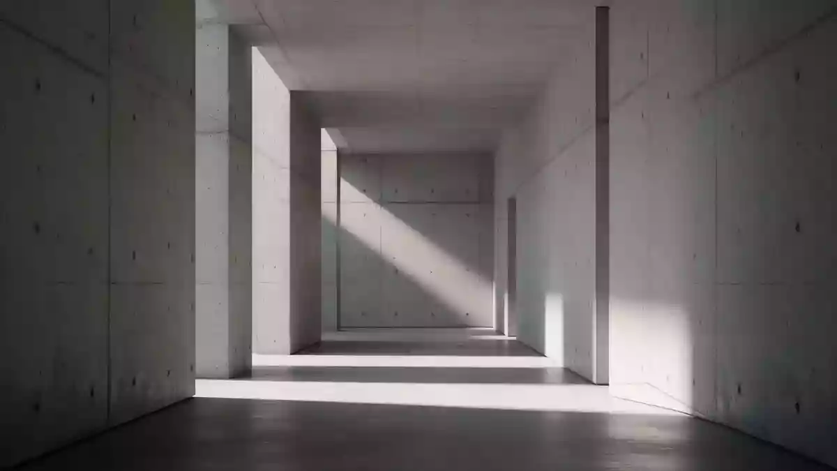 Ein minimalistischer, moderner Flur mit klaren architektonischen Linien und weichem Lichteinfall. Illustration mit AI erstellt.