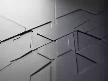 Abstrakte geometrische Muster auf einer matten, metallischen Oberfläche bei kühlem, diffusem Licht. - Foto: über boerse-global.de