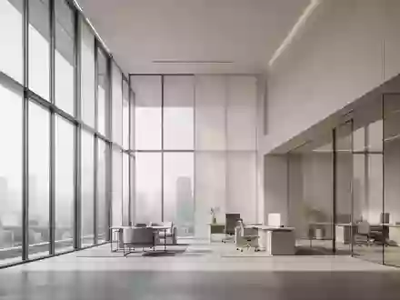 Ein minimalistisch gestalteter, heller Büroraum mit klaren architektonischen Linien und natürlichem Lichteinfall. - Foto: über boerse-global.de