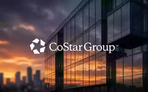 Abstrakte Darstellung eines modernen Bürogebäudes bei Sonnenuntergang als Symbol für Unternehmensübernahmen und Marktdynamik. - Foto: über boerse-global.de