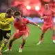 Lieferten sich eine umkämpfte Partie: Borussia Dortmund und der SV Werder Bremen. - Bild: Fabian Strauch/dpa