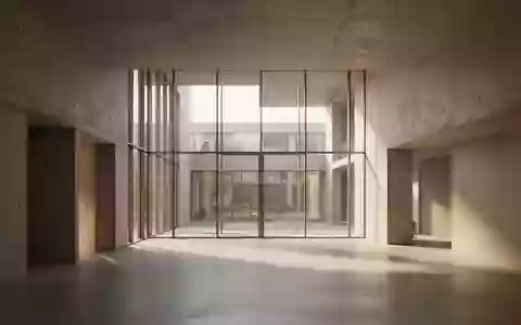 Ein minimalistisch gestalteter Flur in einem modernen deutschen Verwaltungsgebäude mit hellem Licht und klarer Architektur. - Foto: über boerse-global.de