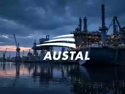 Moderne Werftanlagen bei Dämmerung, symbolisierend industrielle Zusammenarbeit und maritime Ingenieurskunst. - Foto: über boerse-global.de