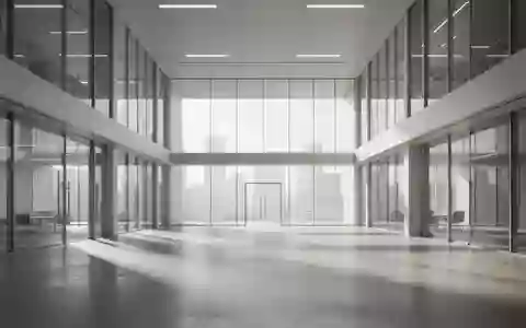 Ein minimalistisches, modernes Bürogebäude mit großen Glasfronten und hellem, natürlichem Tageslicht. - Foto: über boerse-global.de