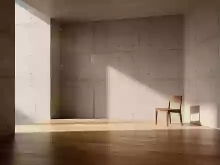 Ein minimalistischer, leerer Raum mit Betonwänden und einfallendem Sonnenlicht, der eine ruhige und technische Atmosphäre vermittelt. - Foto: über boerse-global.de