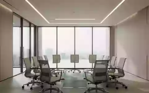 Ein leerer, moderner Konferenzraum mit einem glänzenden Tisch und Stühlen in einer schlichten, professionellen Umgebung. - Foto: über boerse-global.de