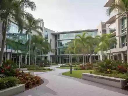 Ein moderner Universitätscampus an der Gold Coast mit befestigten Fußwegen und zeitgenössischer Architektur. - Foto: über boerse-global.de