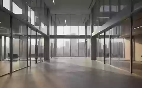 Ein minimalistisches, modernes Bürogebäude mit klaren architektonischen Linien und natürlichem Lichteinfall. - Foto: über boerse-global.de