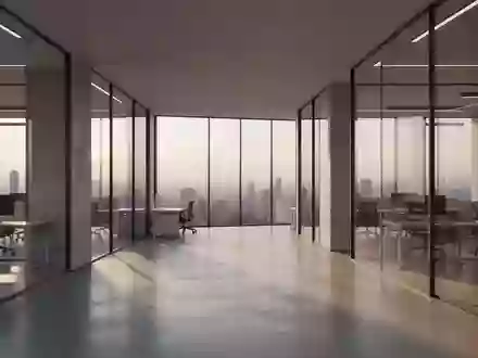 Ein minimalistisches, modernes Büro-Interieur mit klaren architektonischen Linien und sanftem Tageslicht. - Foto: über boerse-global.de