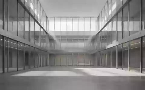 Moderne, minimalistische Architektur in einem hellen Atrium mit klaren Linien und natürlichem Lichteinfall. - Foto: über boerse-global.de