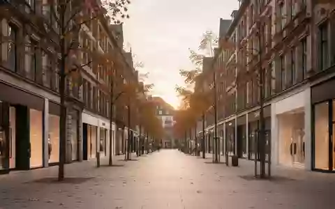 Eine leere, moderne Einkaufsstraße in einer deutschen Großstadt während der Abenddämmerung im Spätherbst. - Foto: über boerse-global.de