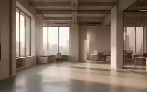 Ein minimalistisches, modernes Büro-Interieur mit klaren architektonischen Linien und natürlichem Lichteinfall auf einem Betonboden. - Foto: über boerse-global.de